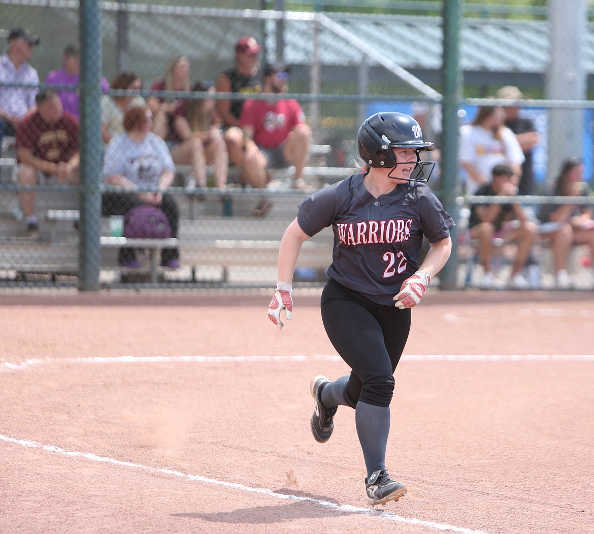 ACH junior Shaina Beal runs to first base after making contact with a pitch against Sunnyside Christian.