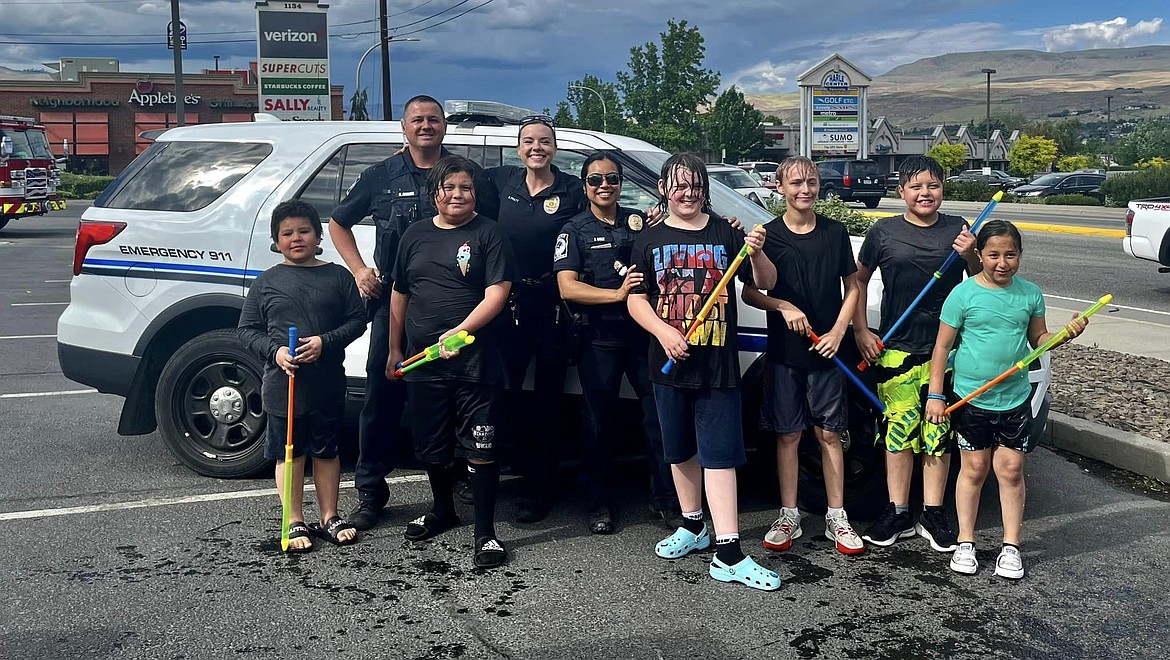 Quincy police and other emergency agencies ganged up on local youth for a squirt gun fight – or was it the other way around? Either way, there was lots of soaking in last Friday’s fundraiser for Special Olympics.