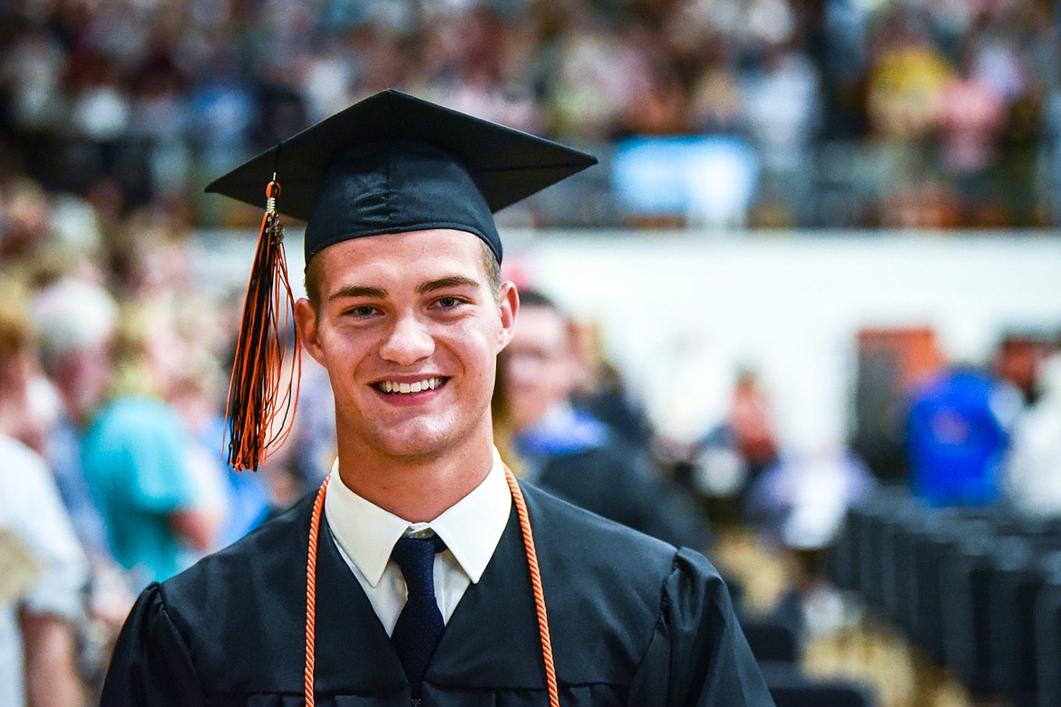 Summa Cum Laude graduate Jackson Walker walks to the stage to give the welcome address at Flathead High School's Class of 2023 125th Commencement ceremony on Friday, June 2. (Casey Kreider/Daily Inter Lake)