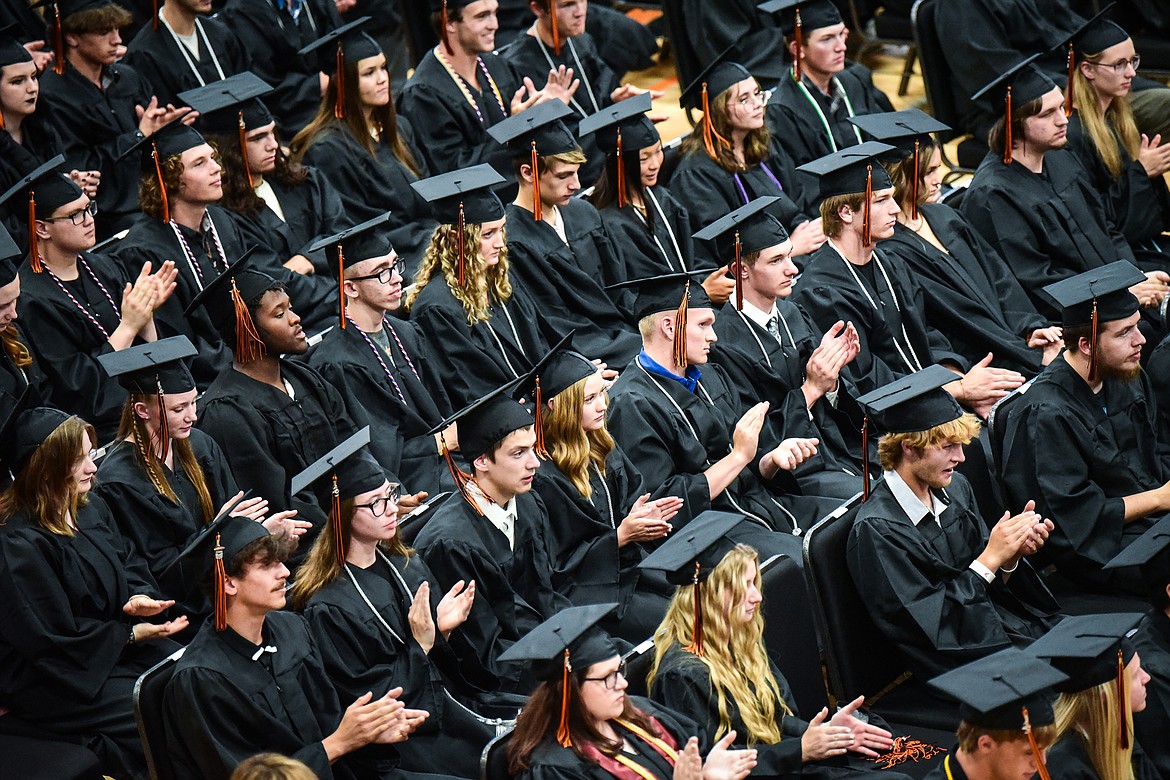 Graduates applaud classmate Aiden DeLong's opening address during Flathead High School's Class of 2023 125th Commencement ceremony on Friday, June 2. (Casey Kreider/Daily Inter Lake)