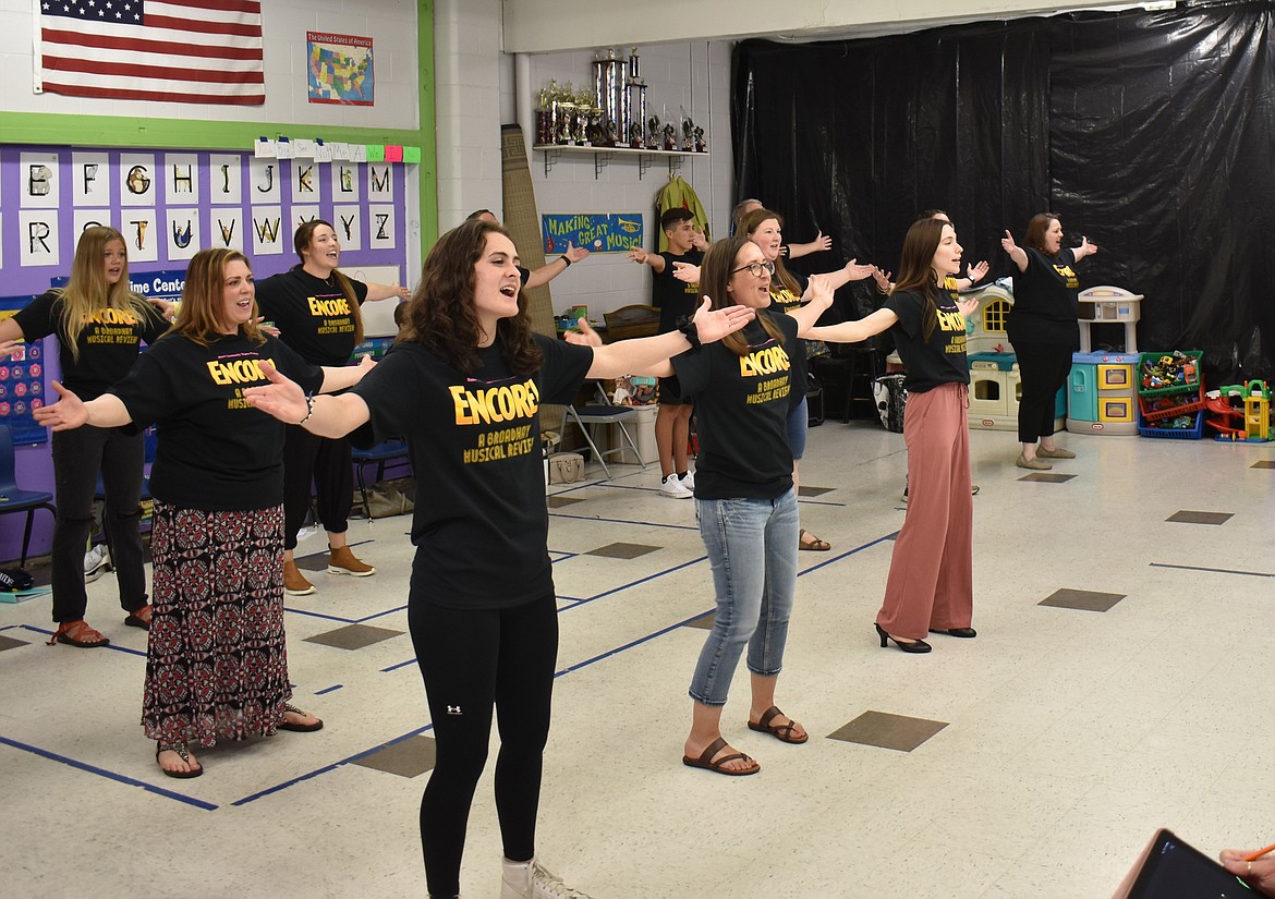 From left: Daisy O'Donnell, Amy O'Donnell, Isabel Sica, Shanna Stakkeland, KaLee Lincoln, JoAnna Miller, Julia Heaps, Claire Crump and Aaron Valdez rehearse “The Greatest Show,” the opening number of “Encore! A Broadway Review,” opening June 14 in Moses Lake.