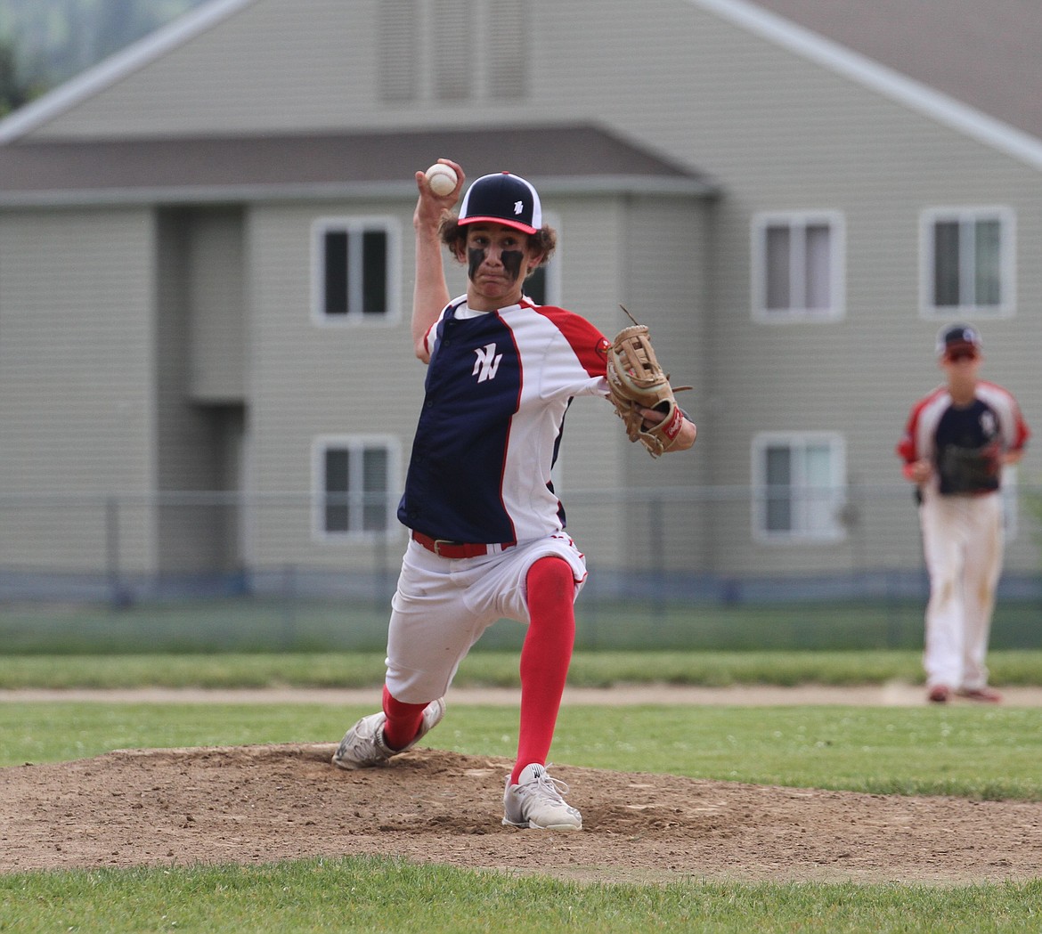 Sage Medeiros gets ready to release a fastball. Medeiros was credited with the win in Game 1.