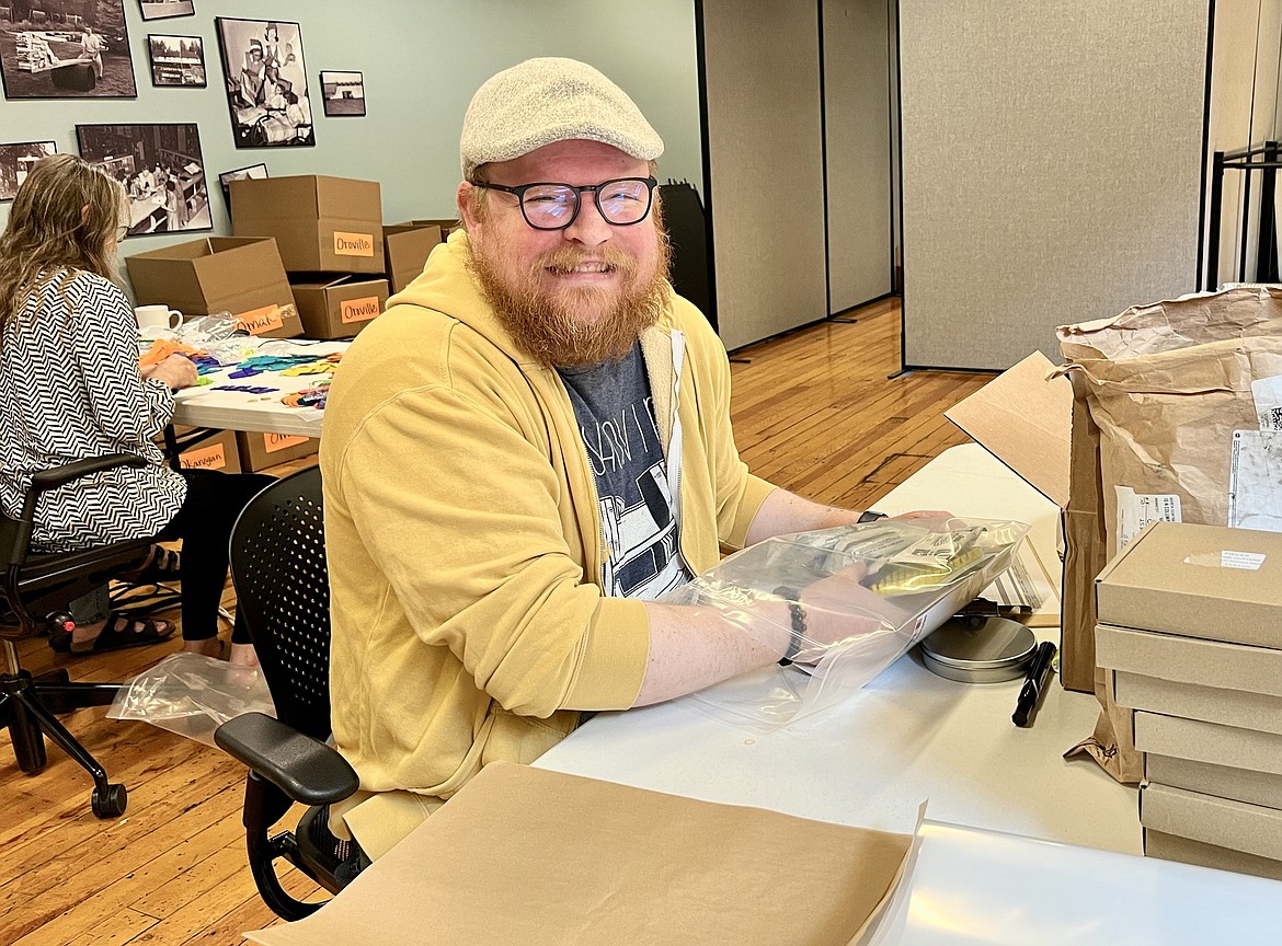 Ephrata Public Library branch supervisor Aaron Loeffelbein prepares for the annual summer library program in late May.