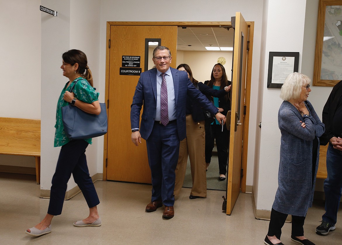 North Idaho College President Nick Swayne leaves the courtroom in June after a judge granted his lawyers' motion for summary judgment, permanently reinstating him as president.