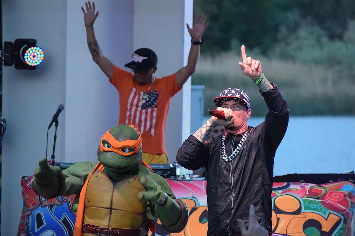 Vanilla Ice, his DJ and Michaelangelo work the crowd during their Spring Fest performance. The festival is put on by a volunteer crew that works to bring the annual tradition to Moses Lake. Volunteers, first responders, carnival staff, vendors and local officials work hard to make the event a safe and fun experience for the Columbia Basin.