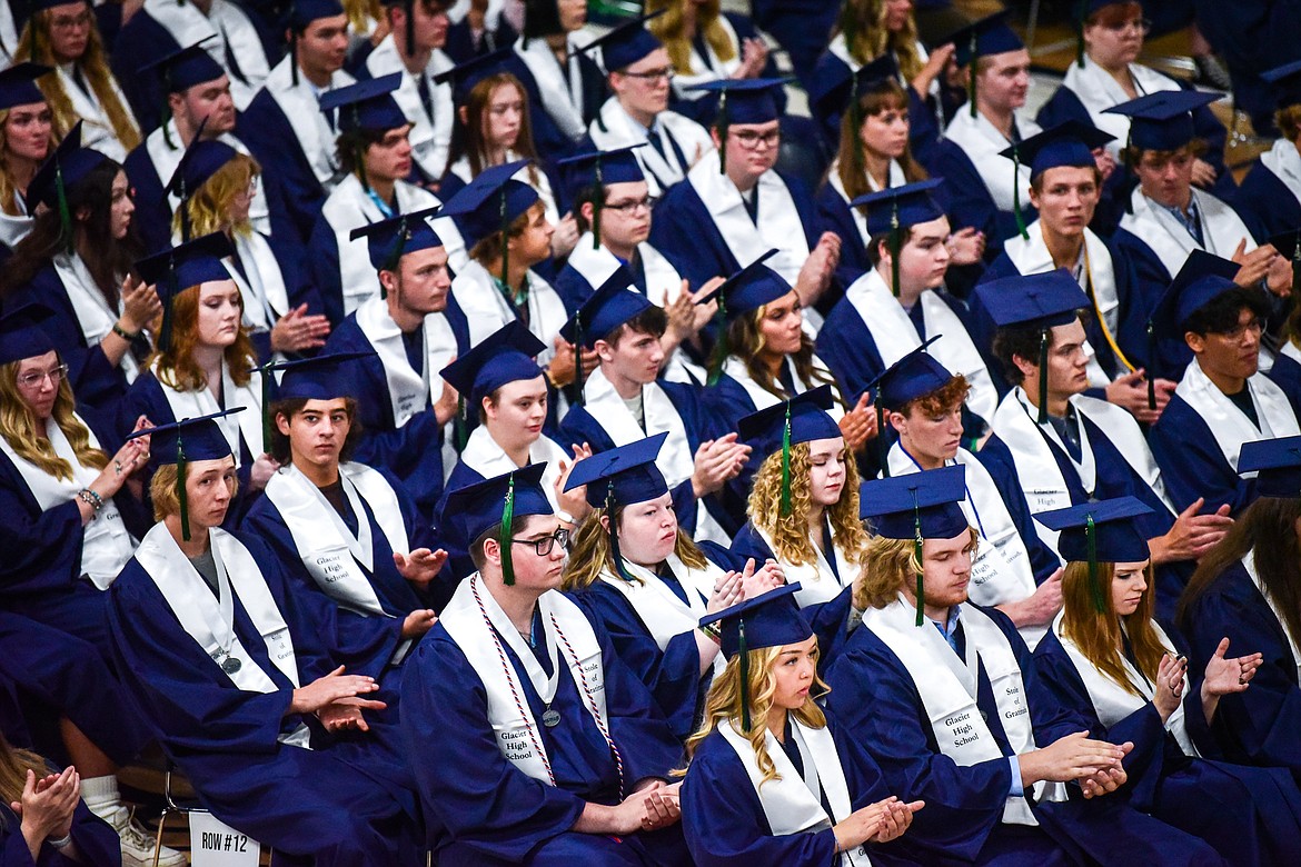 Graduates clap after the principal's welcome speech by Brad Holloway at Glacier High School's commencement ceremony on Saturday, June 3. (Casey Kreider/Daily Inter Lake)