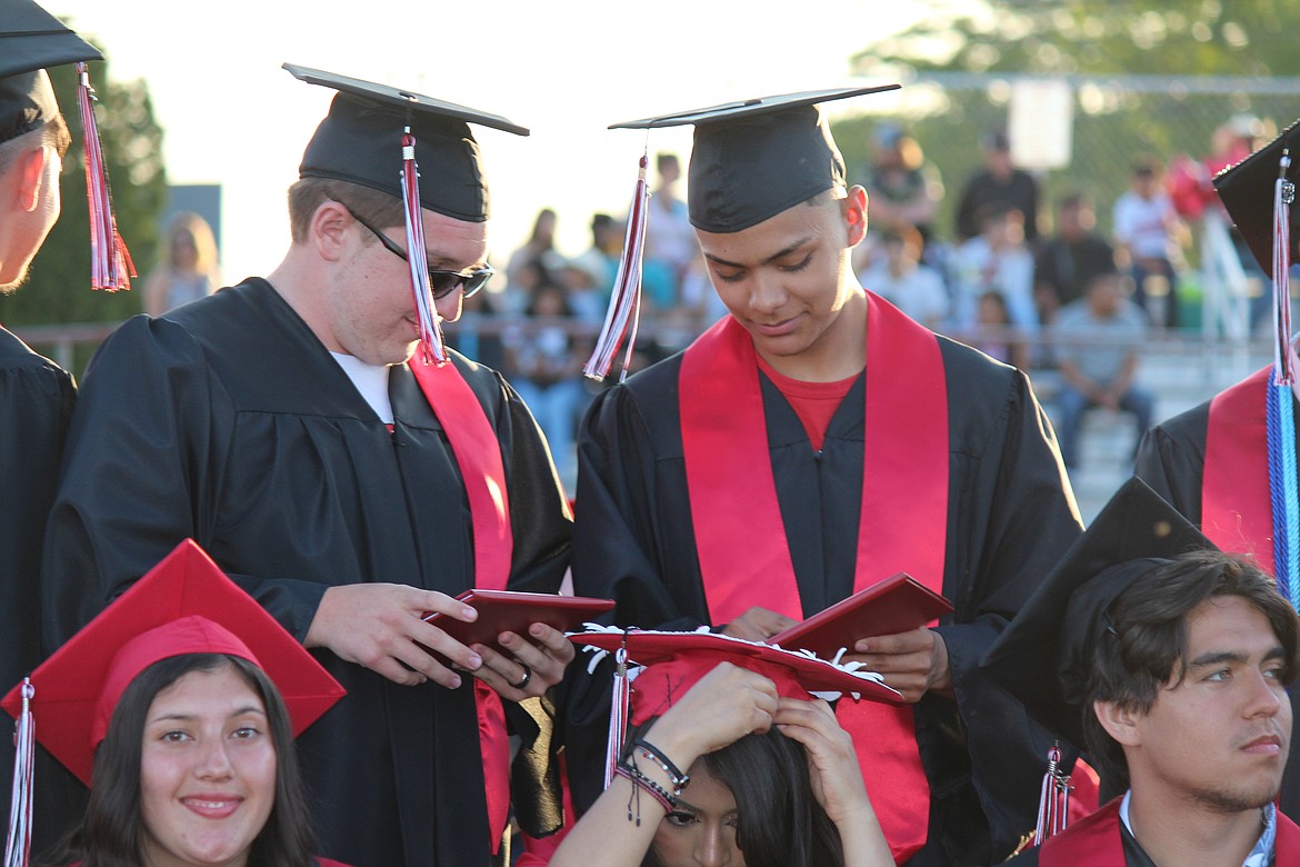 Brand-new Othello High School graduates take a peek at what’s actually inside that diploma cover. About 270 seniors graduated in a ceremony Friday in front of parents, brothers and sisters, aunts and uncles, grandparents, many other relatives and friends.