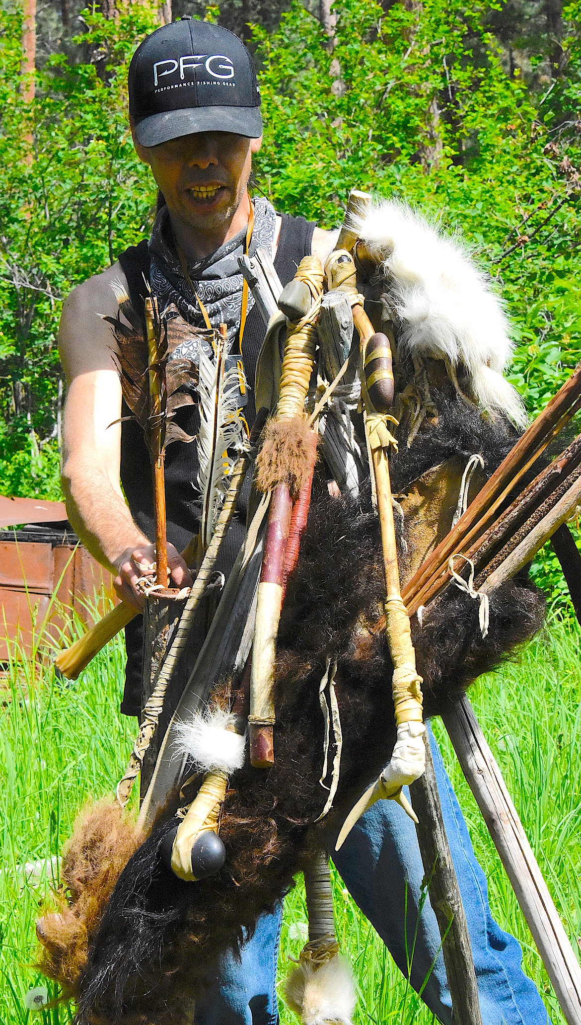 When all of these items -- weapons, quiver, bow and arrows, shield, and on the bottom kitchen tools -- are in view, Buck Hitswithastick is in his tipi. (Berl Tiskus/Leader)