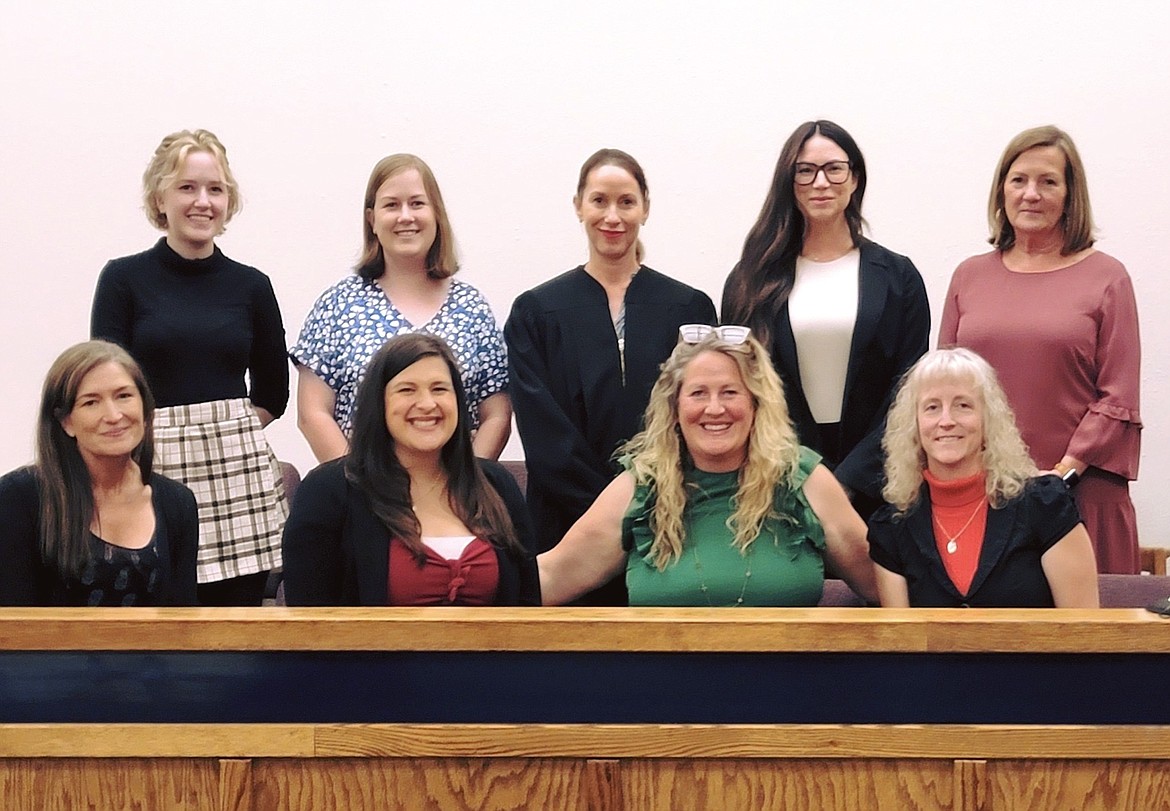 Eight community members were recently sworn in as CASA/GAL volunteers. Pictured in back from left to right, Abby Yarus, Sara Sarafa, Judge Danni Coffman, Brittany Ritchie and Joan Driscoll. In front from left to right, Megan Maitland, Madeline Kasch, Regan Peschel and Patty Christensen.