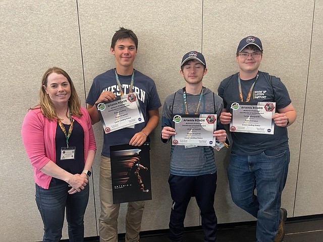 Thompson Falls science teacher Doree Thilmony (left) with students from the winning lunar research project competition Rowan Ackley, Jeremy Fausett and Carter Marquadt. (Courtesy photo)