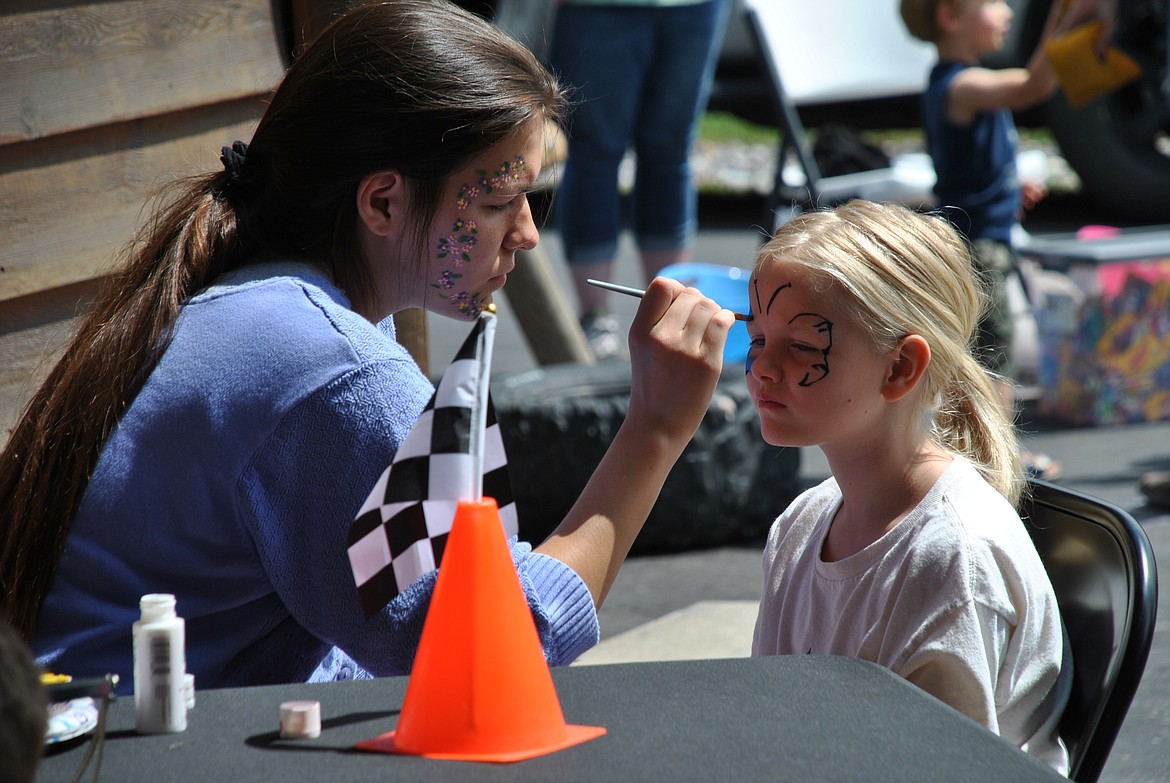 In addition to perusing sweet rides this year, the Old Schoolhouse Rock Car Show incorporated some new children's activities like face painting, and bean bag toss. (Mineral Independent/Amy Quinlivan)