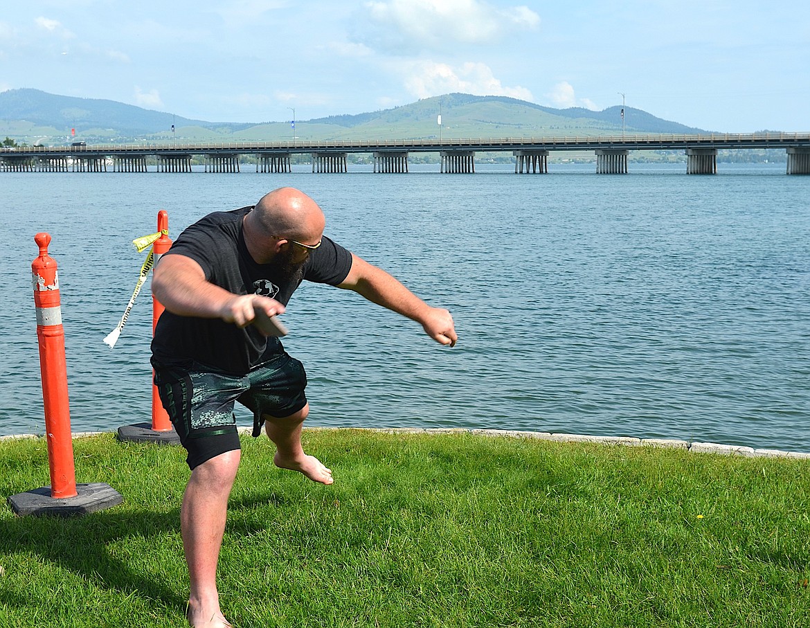 George Murphy exhibits winning form, which helped him launch an 18-skip entry and win top honors in Saturday's World Rock-Skipping Championship. (Kristi Niemeyer/Leader)