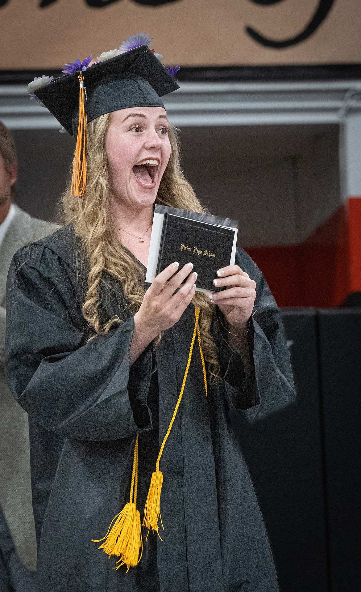 Lillian MacDonald beams with excitement during the Plains High School graduation ceremony. (Tracy Scott/Valley Press)