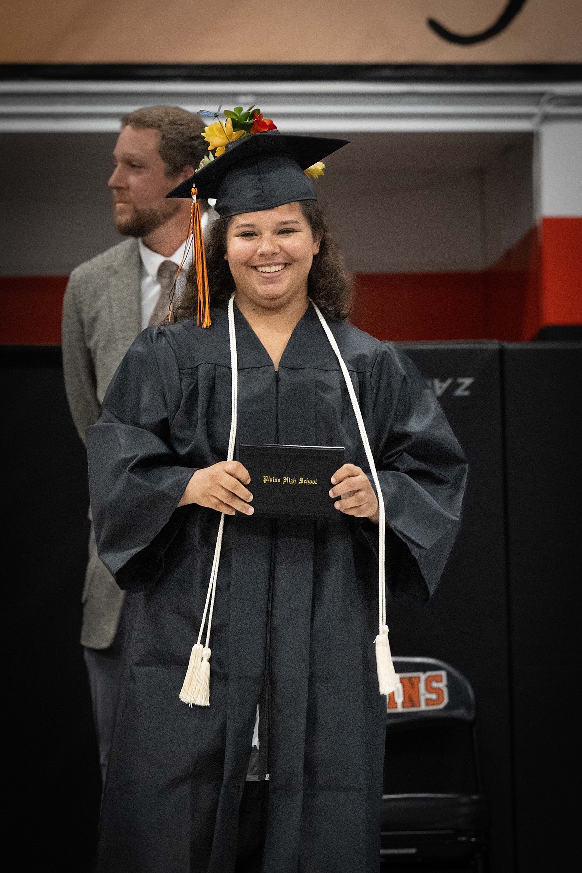 Oceanrose Hyde receives her diploma during Plains High School's commencement ceremony. (Tracy Scott/Valley Press)