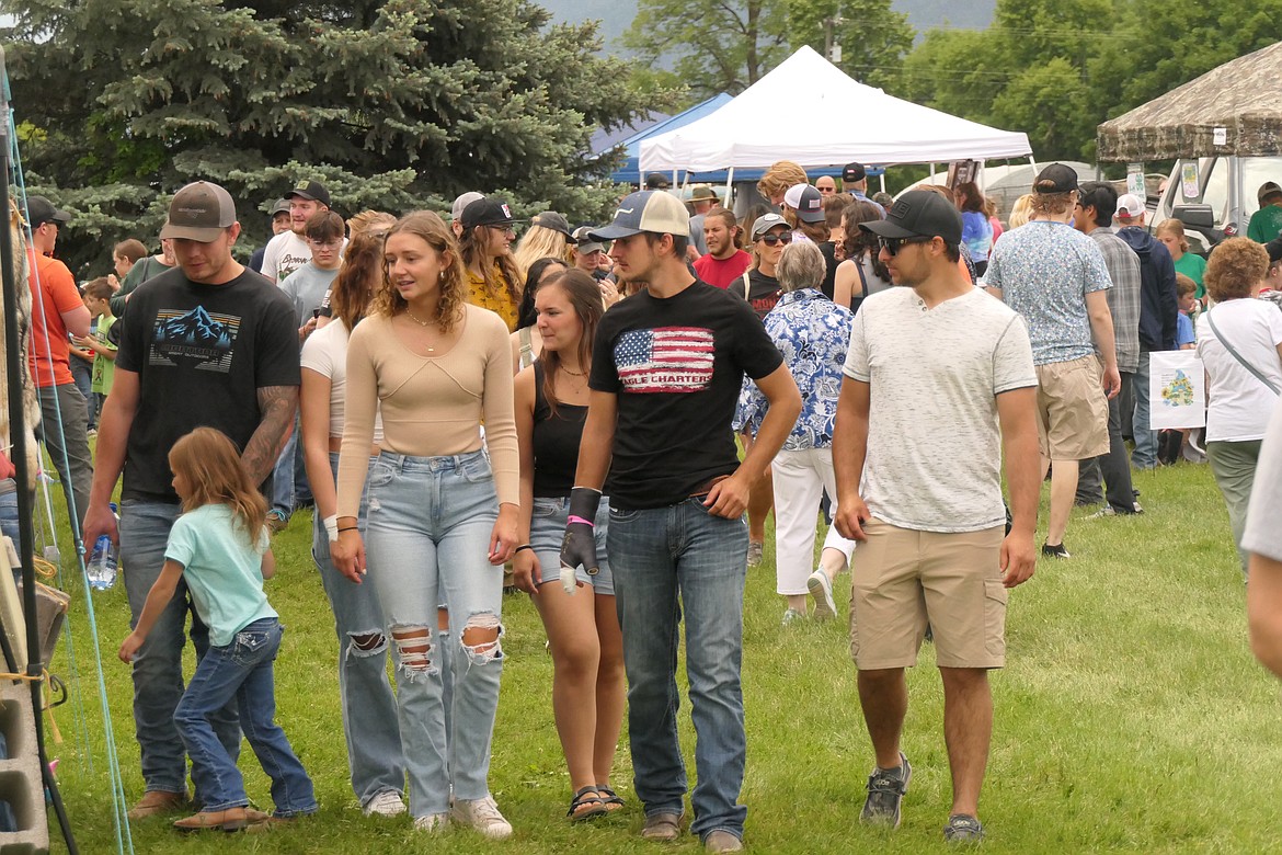 Plains Day event goers filled the vendor and craftsmen display area along Highway 200 throughout the day. (Chuck Bandel/VP-MI)