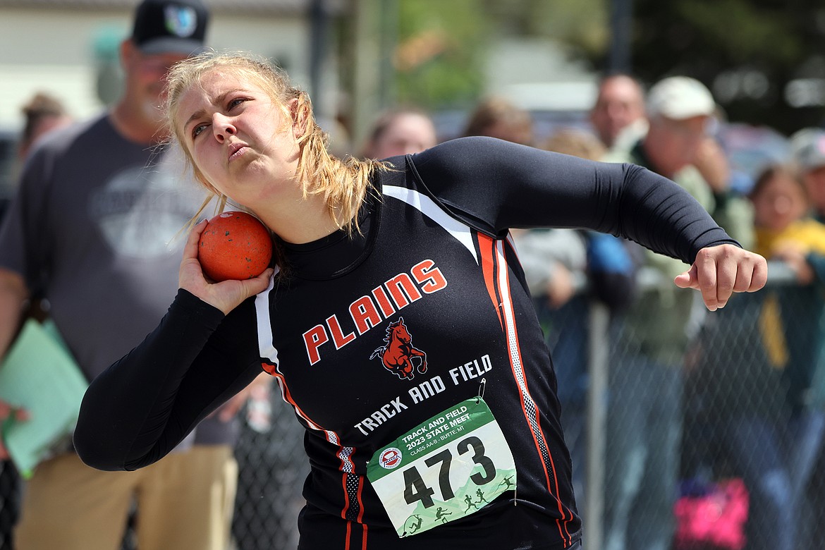 Alexis Deming of Plains competes in the shot put at the State AA/B Track Meet in Butte. (Jeremy Weber)