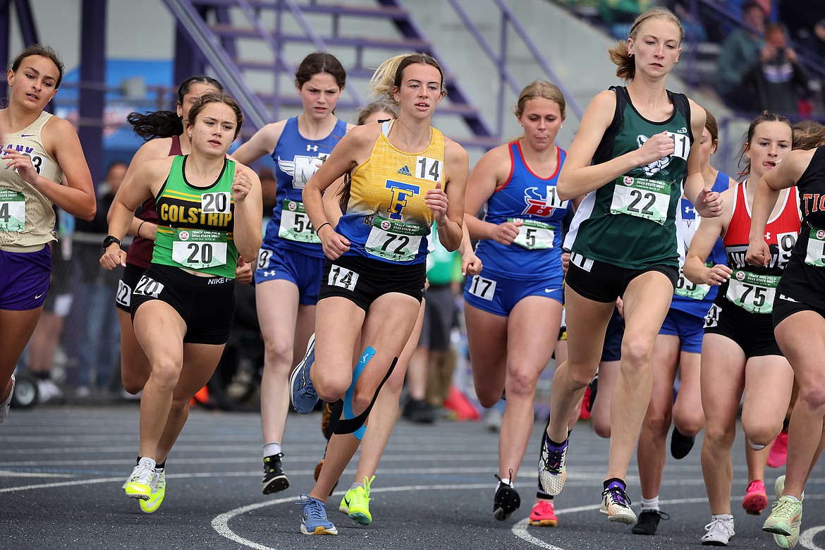 Ellie Baxter of Thompson Falls competes in the 800-meter run at the State AA/B Track Meet in Butte. (Jeremy Weber)