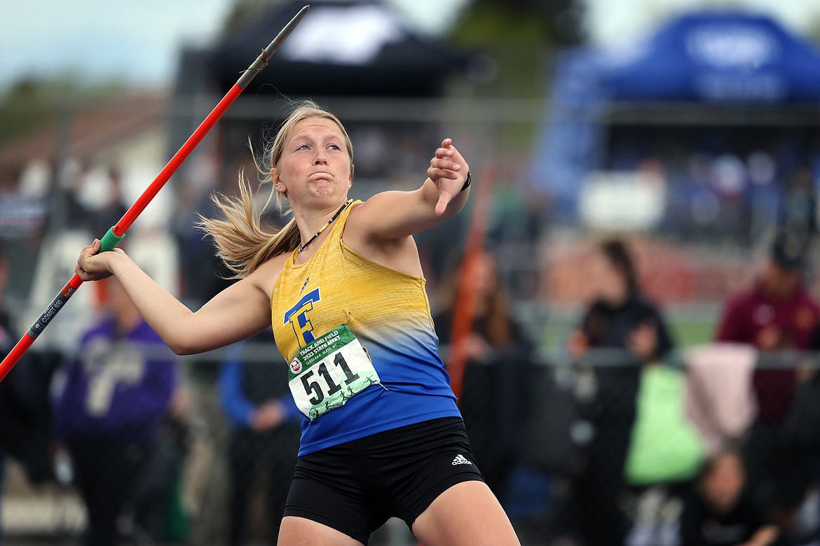 Chesney Lowe of Thompson Falls throws the javelin at the State AA/B Track Meet in Butte. (Jeremy Weber)