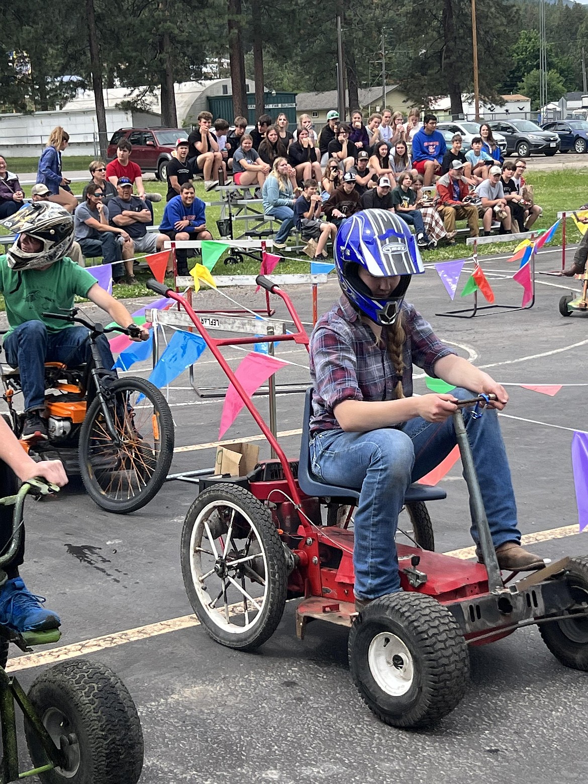 Riley Tweed races a go cart built in Superior High School's small engine class. (Kami Milender photo)