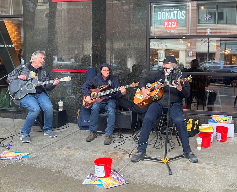 The Trailer Park Girls (from left) Joe Brasch, Jeff Peterson and Doug Clark perform at the Street Music Week fundraiser for Second Harvest.