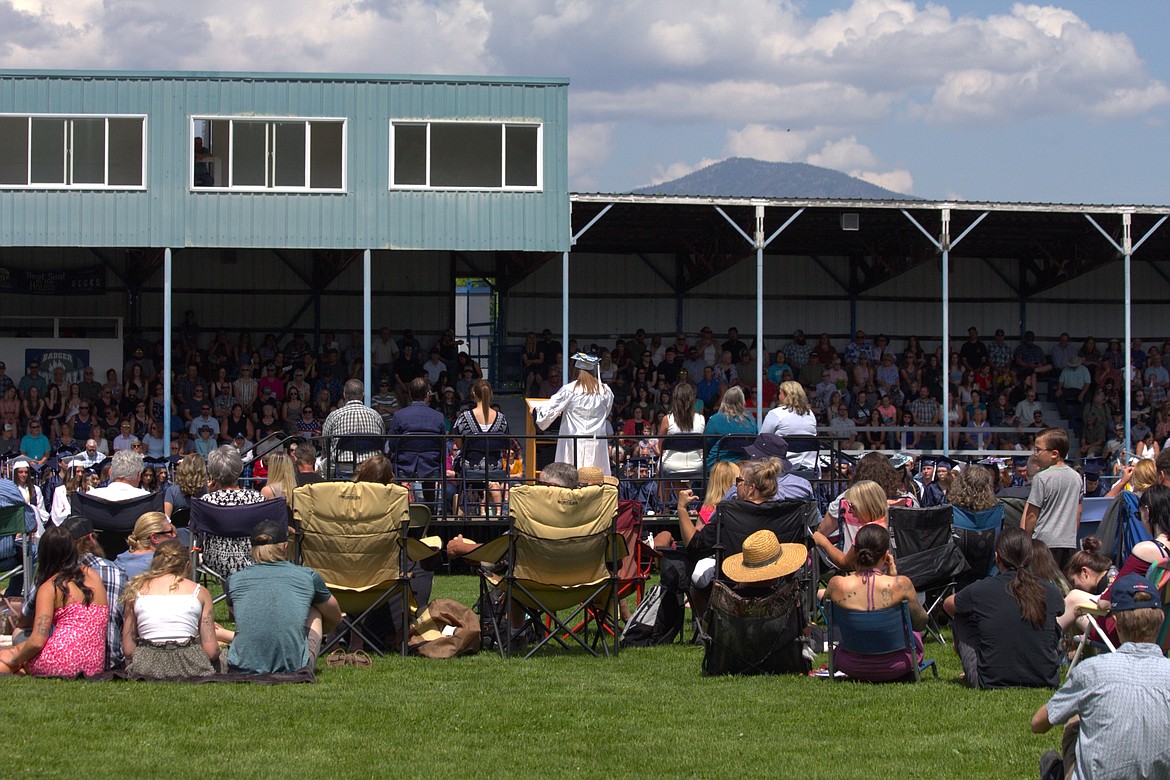 Salutatorian Kaylee McCabe address Class of 2023 and a full grand stand and packed field of attendees.