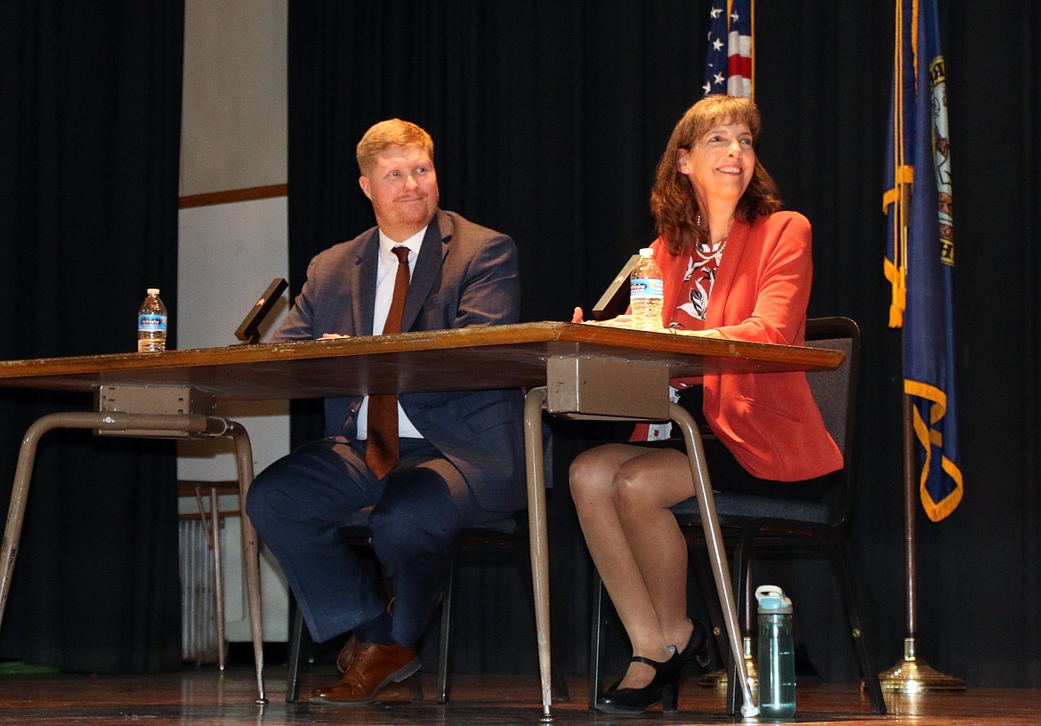 Branden Durst, left, and Susie Luckey listen to a question at a Wednesday community forum which gave residents a chance to ask the West Bonner County School District finalists a chance to ask them questions.