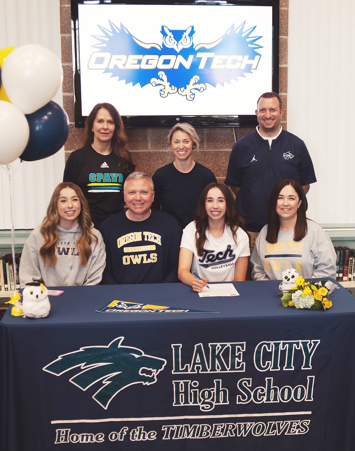 Courtesy photo
Lake City High senior Aubrey Stennett recently signed a letter of intent to play volleyball at NAIA Oregon Tech in Klamath Falls, Ore. Seated from left are Alissa Stennett (sister), Jess Stennett (dad), Aubrey Stennett and Amy Stennett (mom); and standing from left, Nicole Rayborn, Lake City High assistant volleyball coach; Michelle Kleinberg, Lake City High head volleyball coach; and Troy Anderson, Lake City High athletic director.