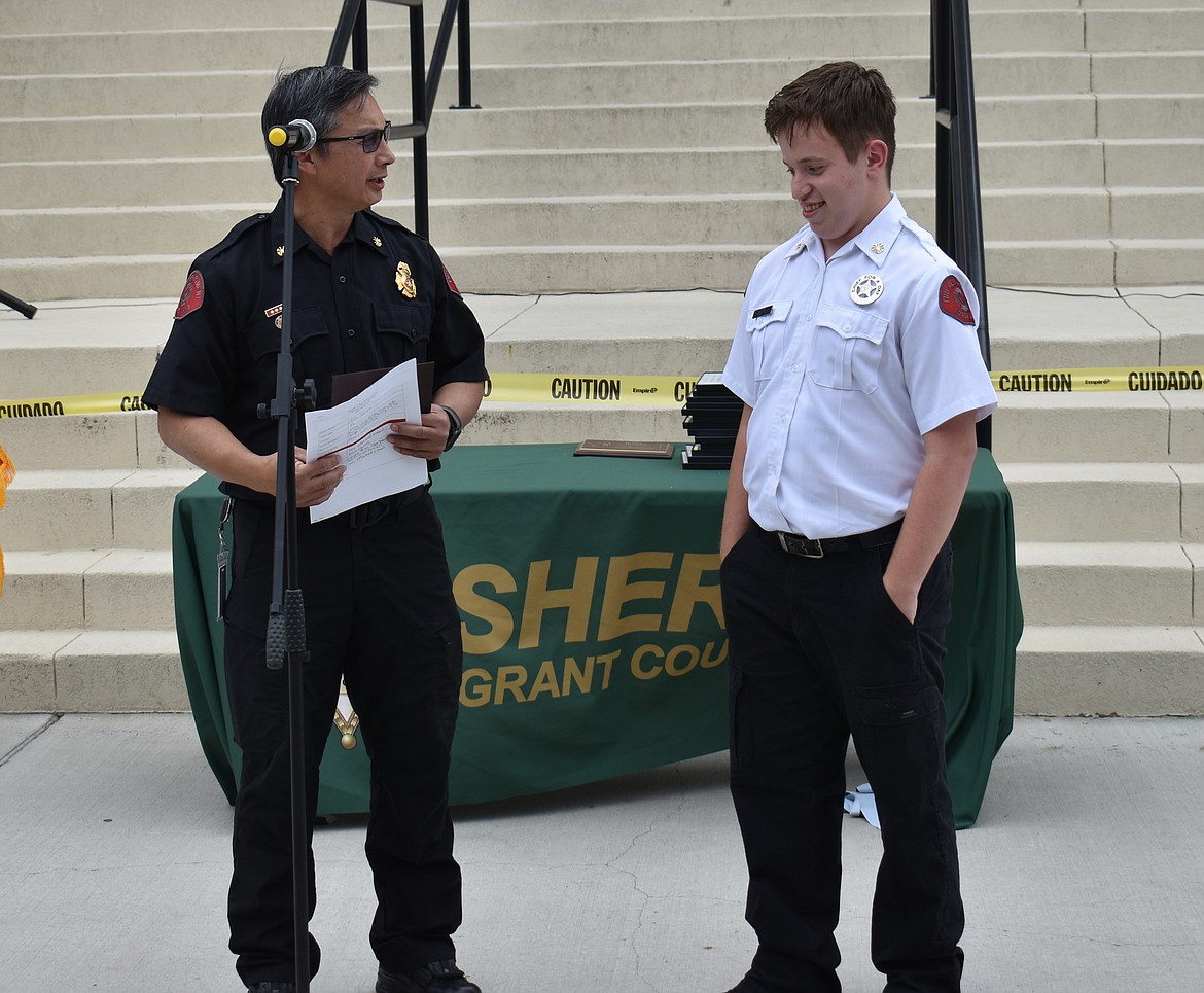 Moses Lake Fire Department Asst. Chief Pete Kunjara introduces Chief-for-a-Day DJ Parker.