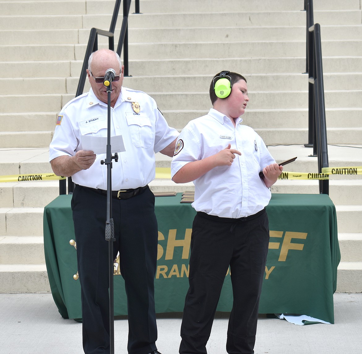 Grant County Fire District 13 Chief Jim Stucky has a little trouble keeping the attention of Chief-for-a-Day Kaden Nelson. Chief Nelson is autistic and nonverbal, Stucky said.