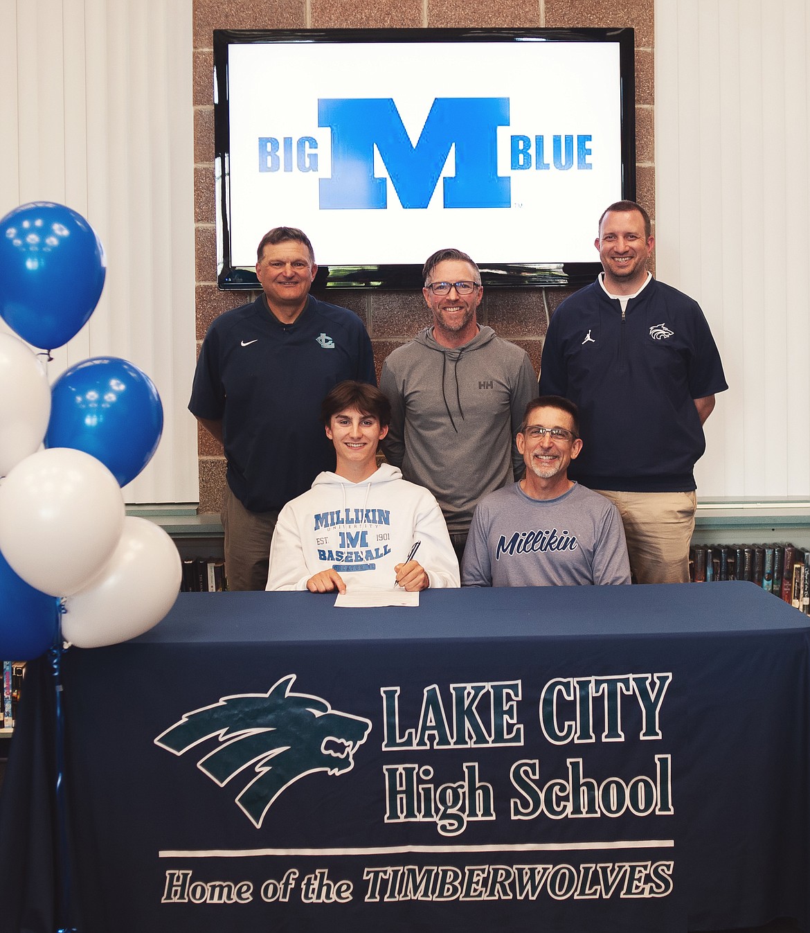 Courtesy photo
Lake City High senior Karl Schwarzer recently signed a letter of intent to play baseball at NCAA Division III Millikin University in Decatur, Ill. Seated from left are Karl Schwarzer and Steve Schwarzer (dad); and standing from left, Paul Manzardo, former Lake City High head baseball coach; Mike Criswell, Lake City High head baseball coach; and Troy Anderson, Lake City High athletic director.