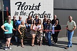 Cutting the ribbon for Florist in the Garden