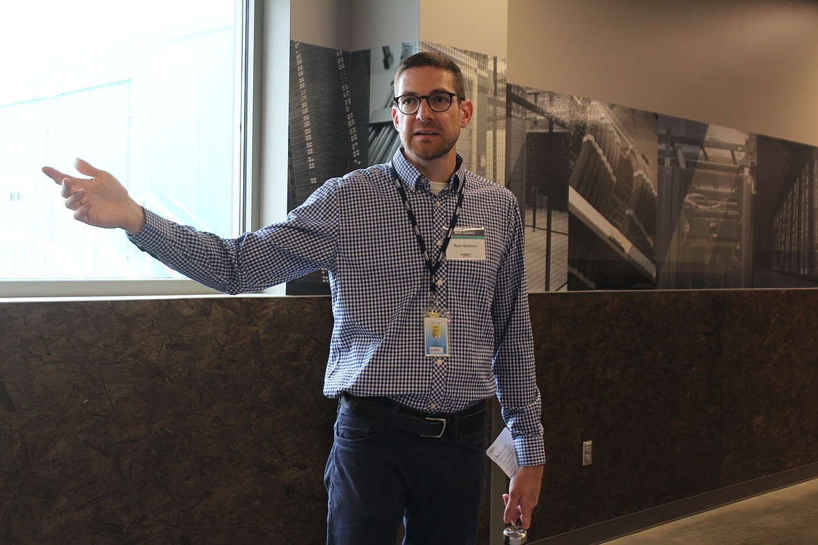 Sabey Data Centers vice president Ryan Beebout conducts a tour of the company’s nearly-completed expansion in Quincy.