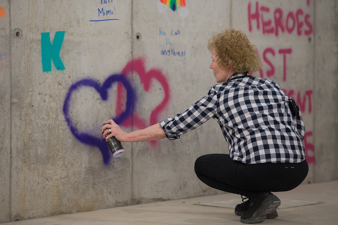 Participants used markers, paints, brushes and spray paint in support of cancer patients.