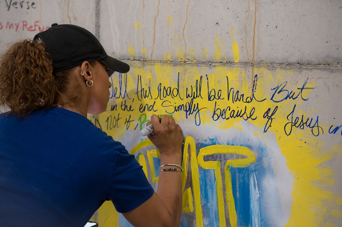 Cancer patients and their families took time to write down their sentiments about cancer and survival at the Written in Stone event sponsored by the Columbia Basin Cancer Foundation.