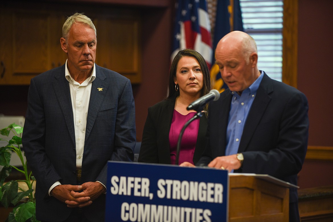 Gov. Greg Gianforte speaks at a bill signing ceremony at the Flathead County Courthouse on June 9, 2023. State Rep. Courtenay Sprunger, R-Kalispell, who sponsored both bills that Gianforte signed, is seen behind the governor with U.S. Congressman Ryan Zinke next to her. (Kate Heston/Daily Inter Lake)