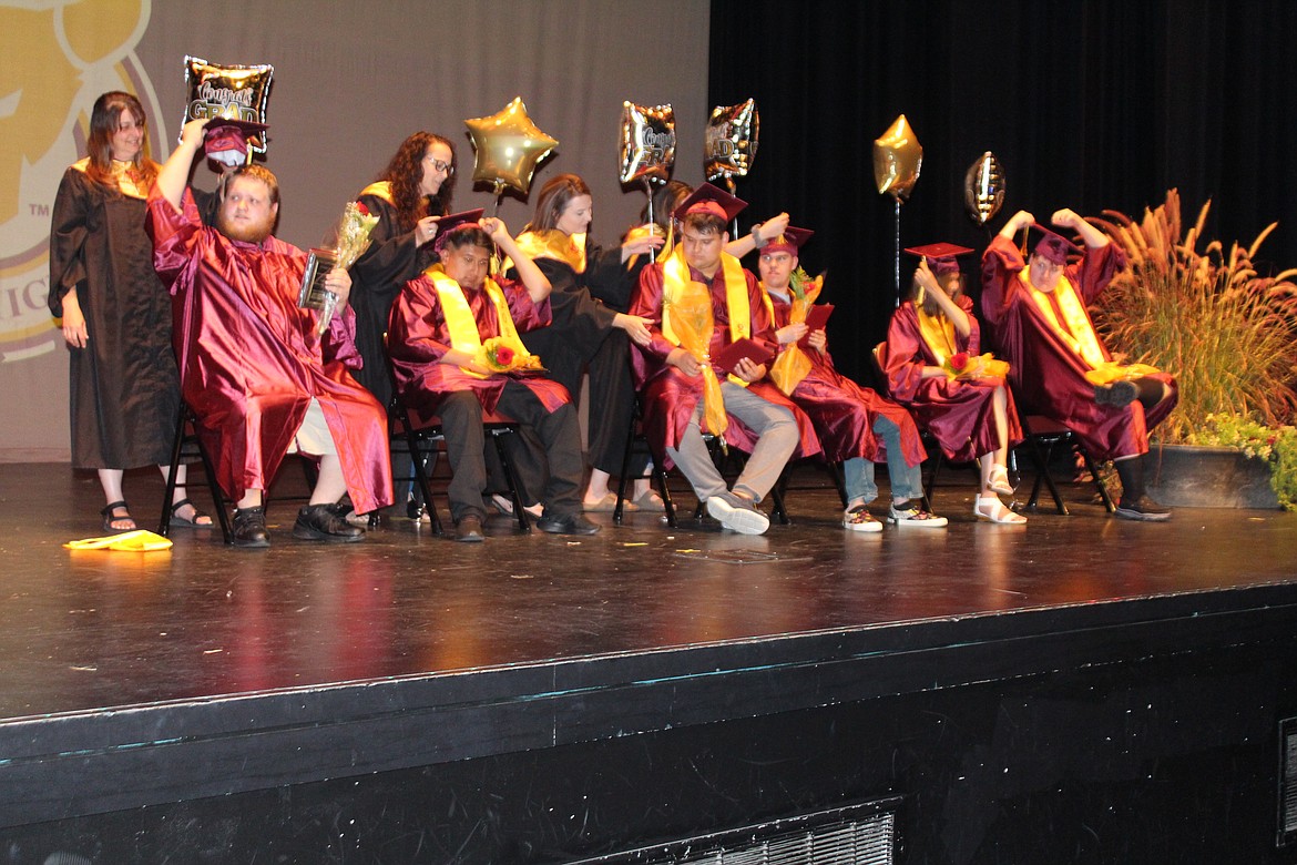 The PALS club graduates and instructors turn the tassel, signaling the students have completed their Moses Lake HIgh School education.