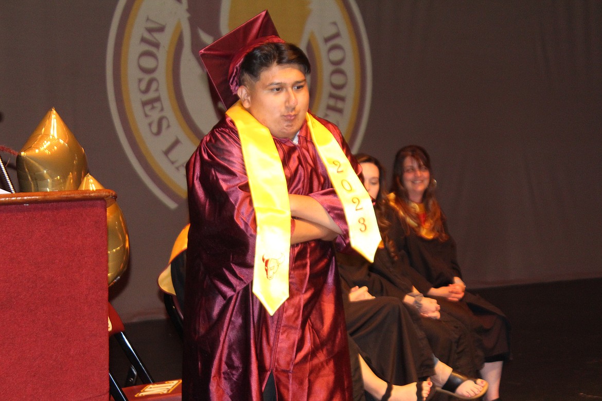 Cristian Avina-Cruz waits to receive his diploma at the PALS graduation ceremony at Moses Lake High School.