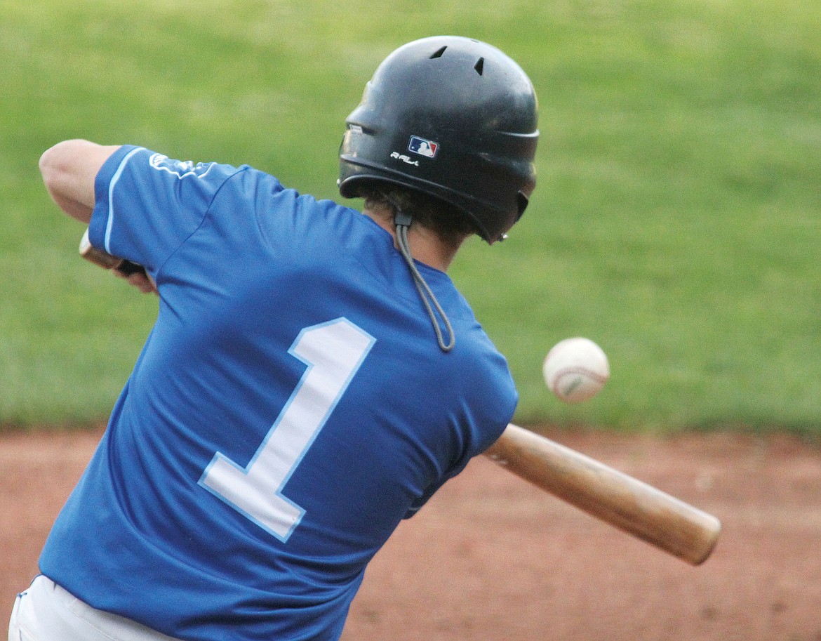 Libby's James Redifer bunted safely in the bottom of the fourth inning to  put runners on first and second in the second game of a doubleheader Saturday, June 10. Mission won, 19-10. (Paul Sievers/The Western News)