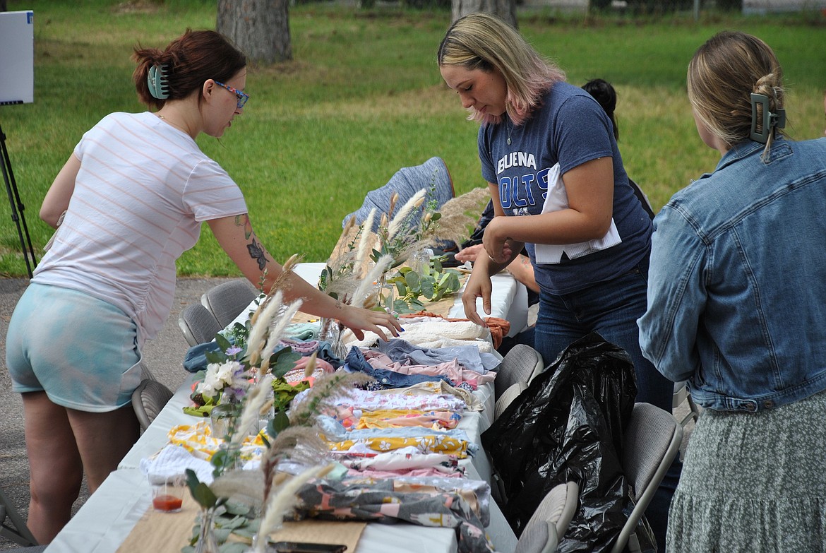 A clothing swap was just one of the many special activities arranged for guests at the community wide baby shower put on by Mineral County Parents as Teachers last weekend. (Mineral Independent/Amy Quinlivan)