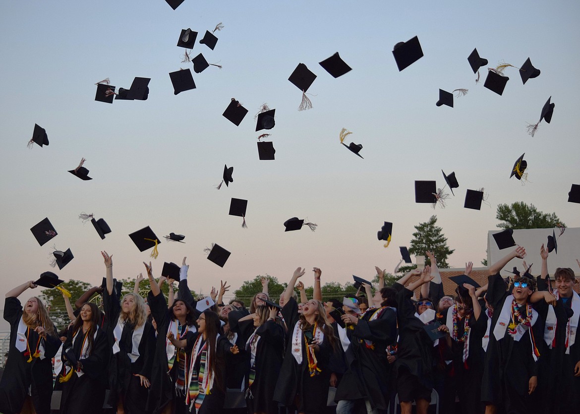 Ephrata High School graduates toss their caps in the air at the end of the 2023 graduation ceremony.