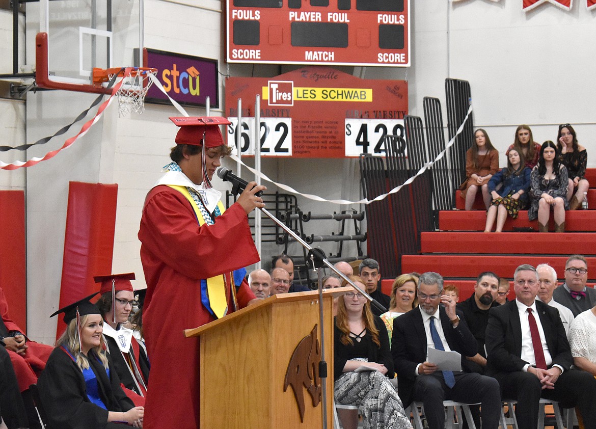 Graduating Lind-Ritzville senior Hunter Dinkins gives a closing address at graduation Saturday. “The time is now that we walk off the school grounds with our footprint left in it forever,” Dinkins said. “A new life awaits us and is ours to grab.”