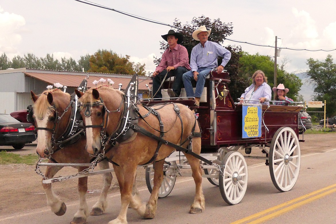 Homesteader Days parade Grand Marshall Maggie Goode rides through Hot Springs in style Sunday afternoon. (Chuck Bandel/VP-MI)