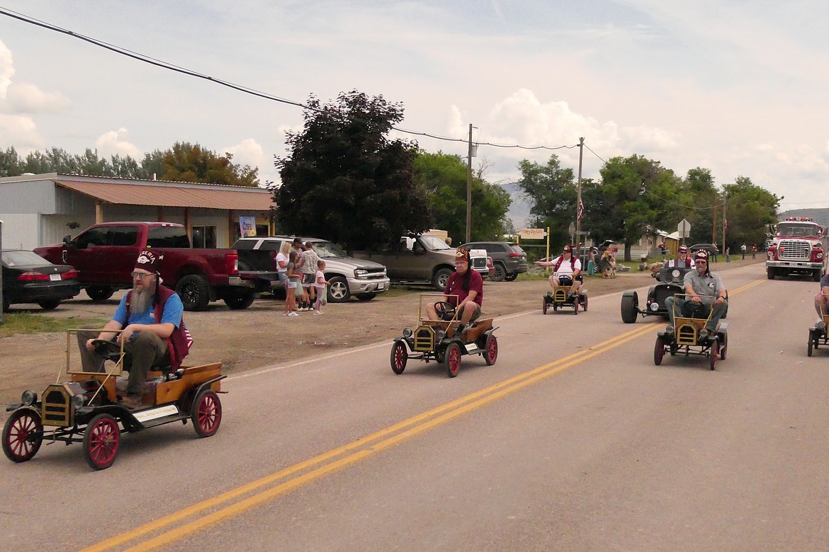 What would a "days gone by" parade be without an appearance by the Shriner mini-cars and drivers?  They were part of Sunday's Homesteader Days parade in Hot Springs. (Chuck Bandel/VP-MI)