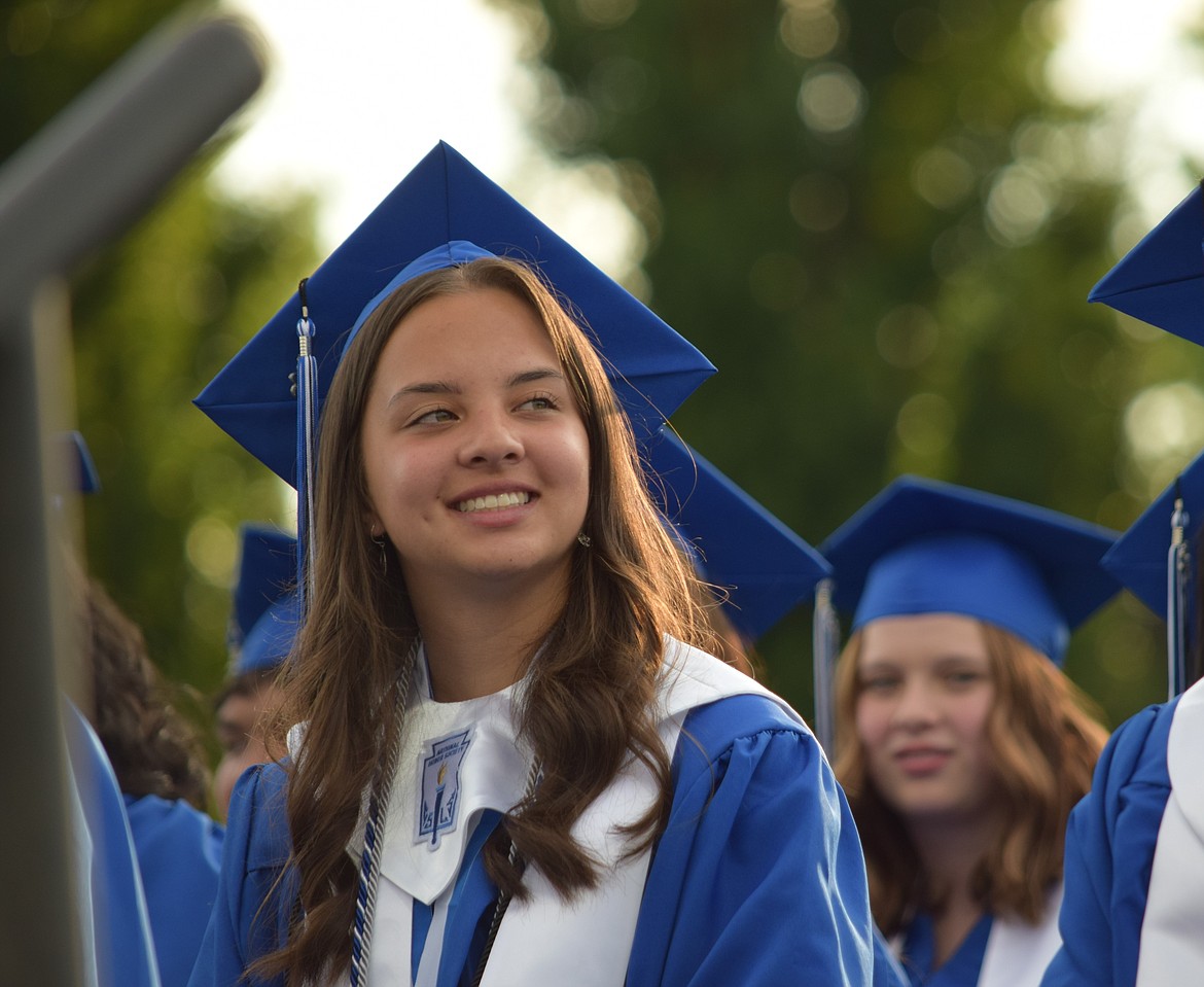 Warden High School class of 2023 member Tamar Rojas Lizagarra listens to a speech during the school’s 2023 graduation ceremony on June 9.