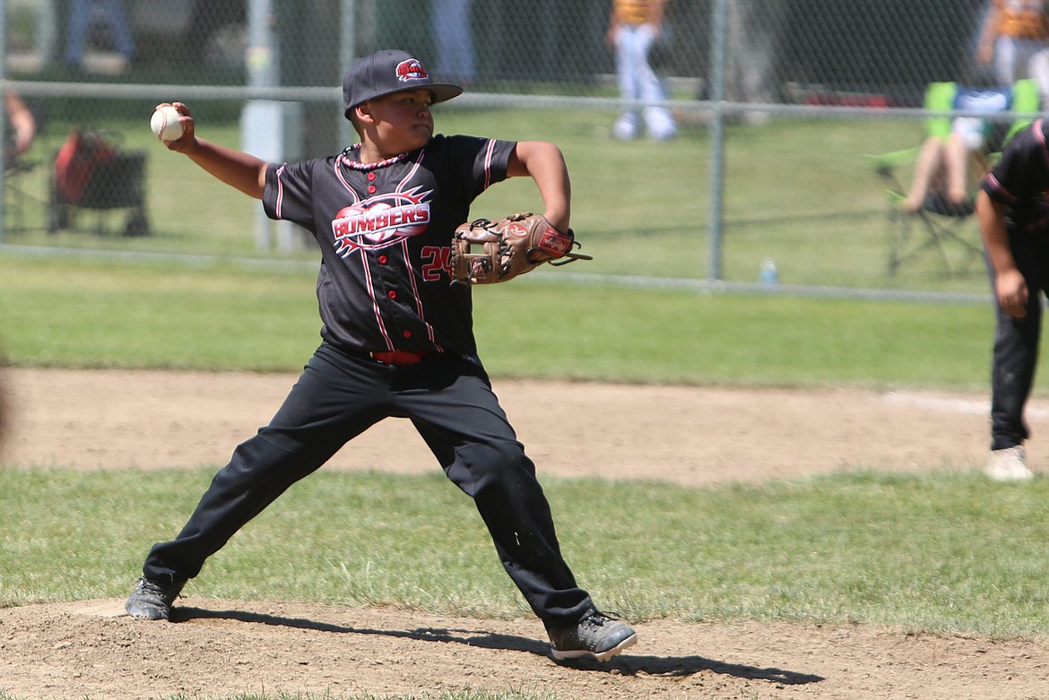 A player for the 10U O-Town Bombers pitches against the 10U Ephrata Tigers at the Pete Doumit Memorial Tournament on Sunday.