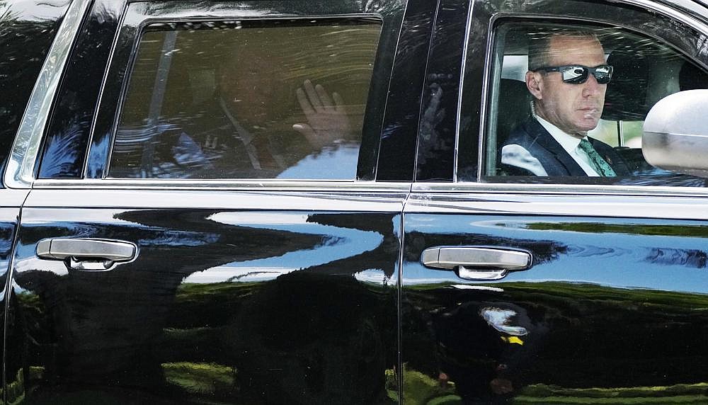 Former President Donald Trump leaves Trump National Doral resort in Doral, Fla., Tuesday, June 13, 2023, on his way to Federal Court. (AP Photo/Jim Rassol)