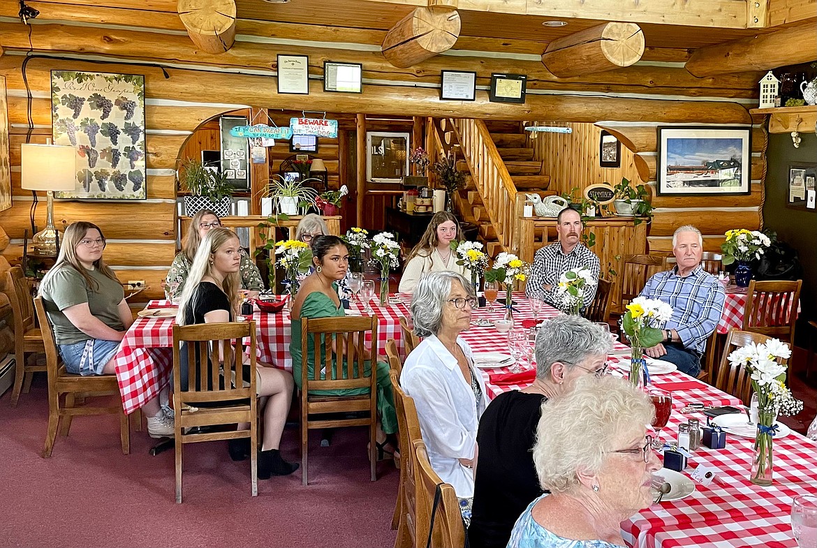 The three scholarship award winners at Saturday’s luncheon included Kaylee McCabe (left), Jasmine Daniels (third from left) and Trew Lammers (sixth from left).