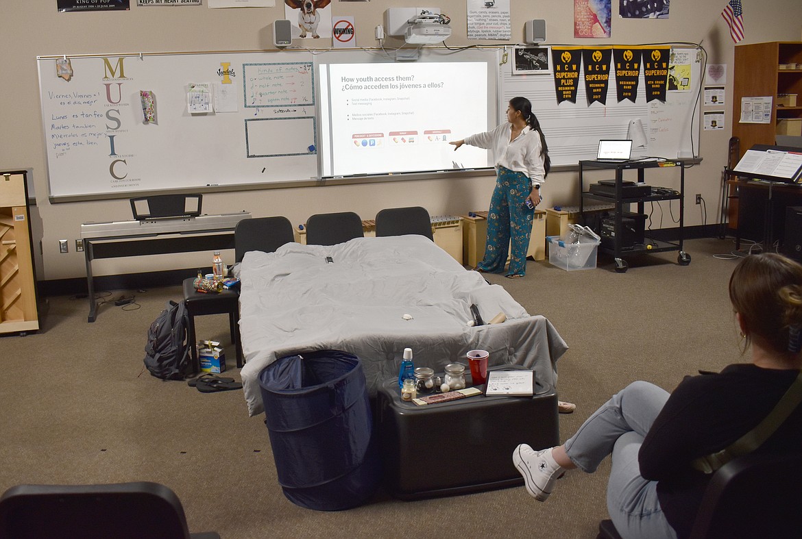 Community Prevention Specialist Brisa Sanchez tells a group of parents how to identify signs of drug use in their children at Healthy Youth, Healthy Families at Royal Intermediate School June 8. A recreation of a teenager’s bedroom serves to illustrate the possible ways kids might hide or disguise drug use at home.