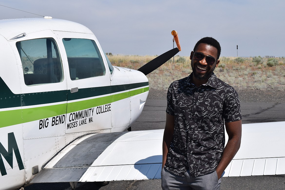 Victoire Wilondja stands next to a Beechcraft Sport 150 used by Big Bend Community College for pilot training. A refugee from the Democratic Republic of Congo, Wilondja is one of 108 recipients of the Washington Award for Vocational Excellence this year to help them pursue skilled technical education.