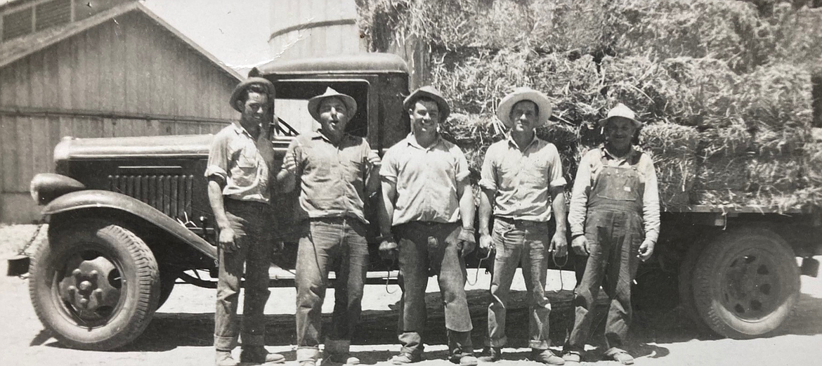 D.F. Oliveria’s father, Franklin (middle) and grandfather, John (right), are shown in 1950s with three Portuguese friends after loading a hay truck.
